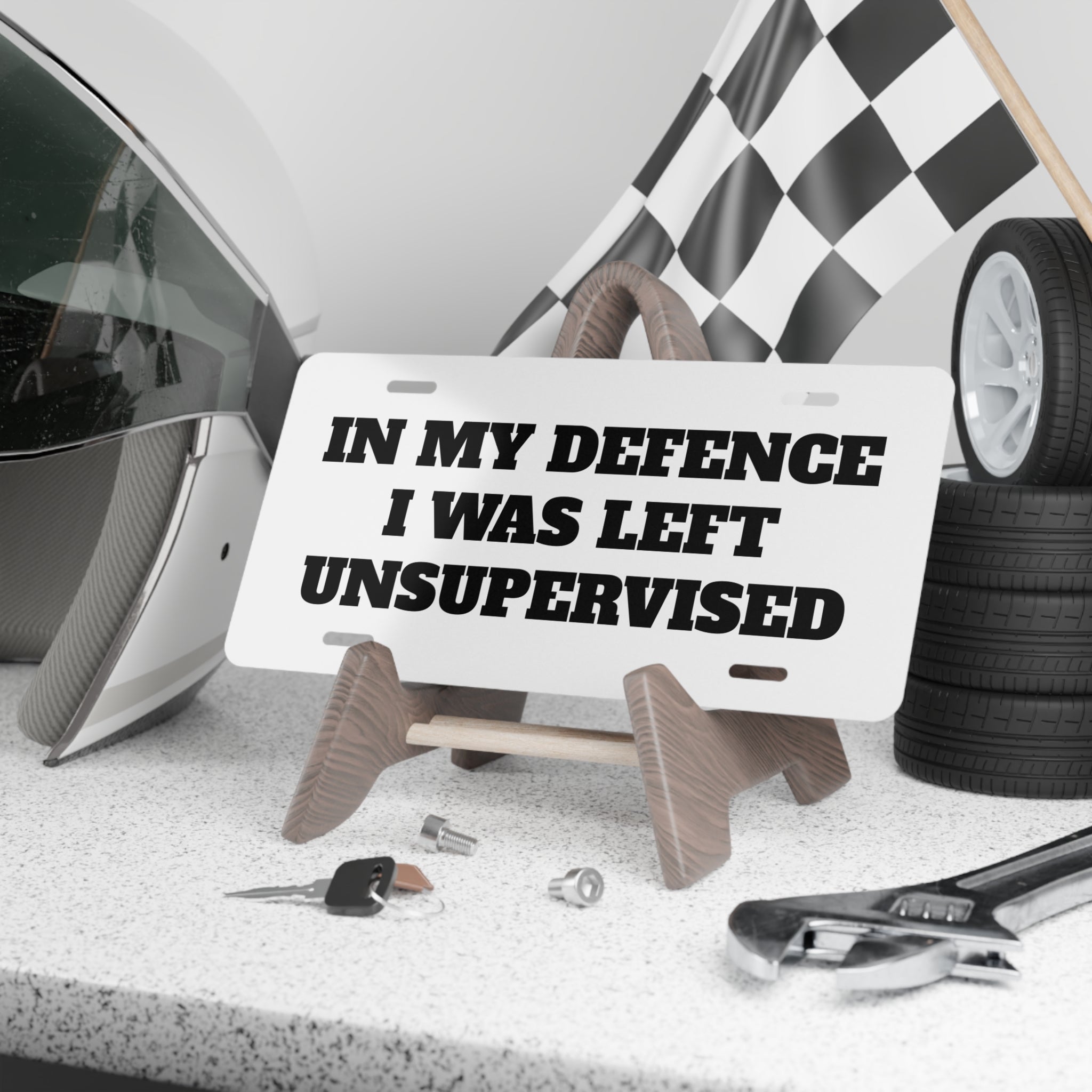 Funny Metal Vanity Plate — "IN MY DEFENCE I WAS LEFT UNSUPERVISED" License Plate